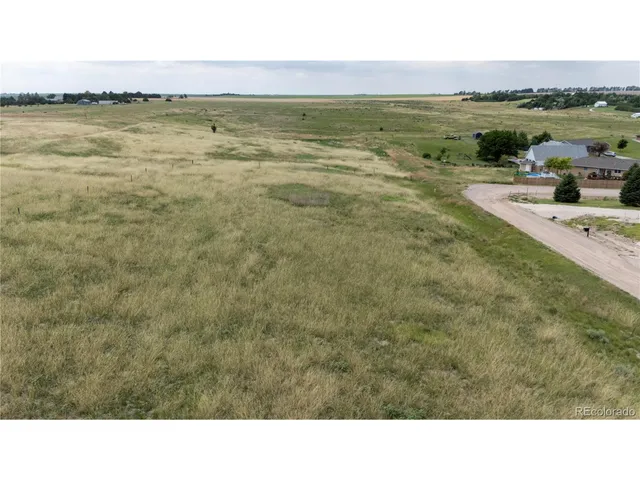 a bathroom with a sink and a yard
