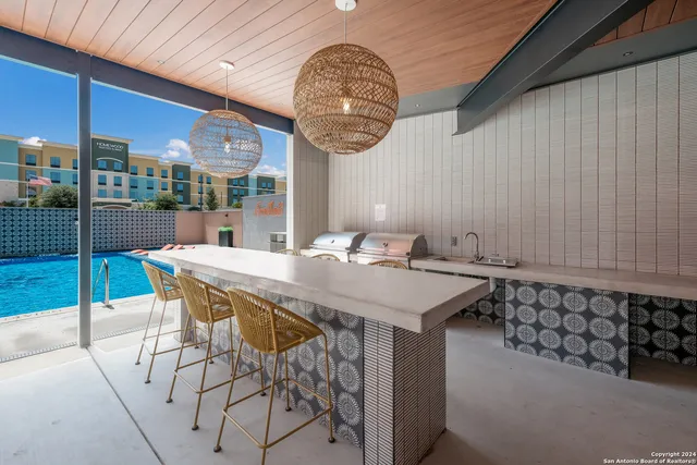 a view of a table and chairs in the patio
