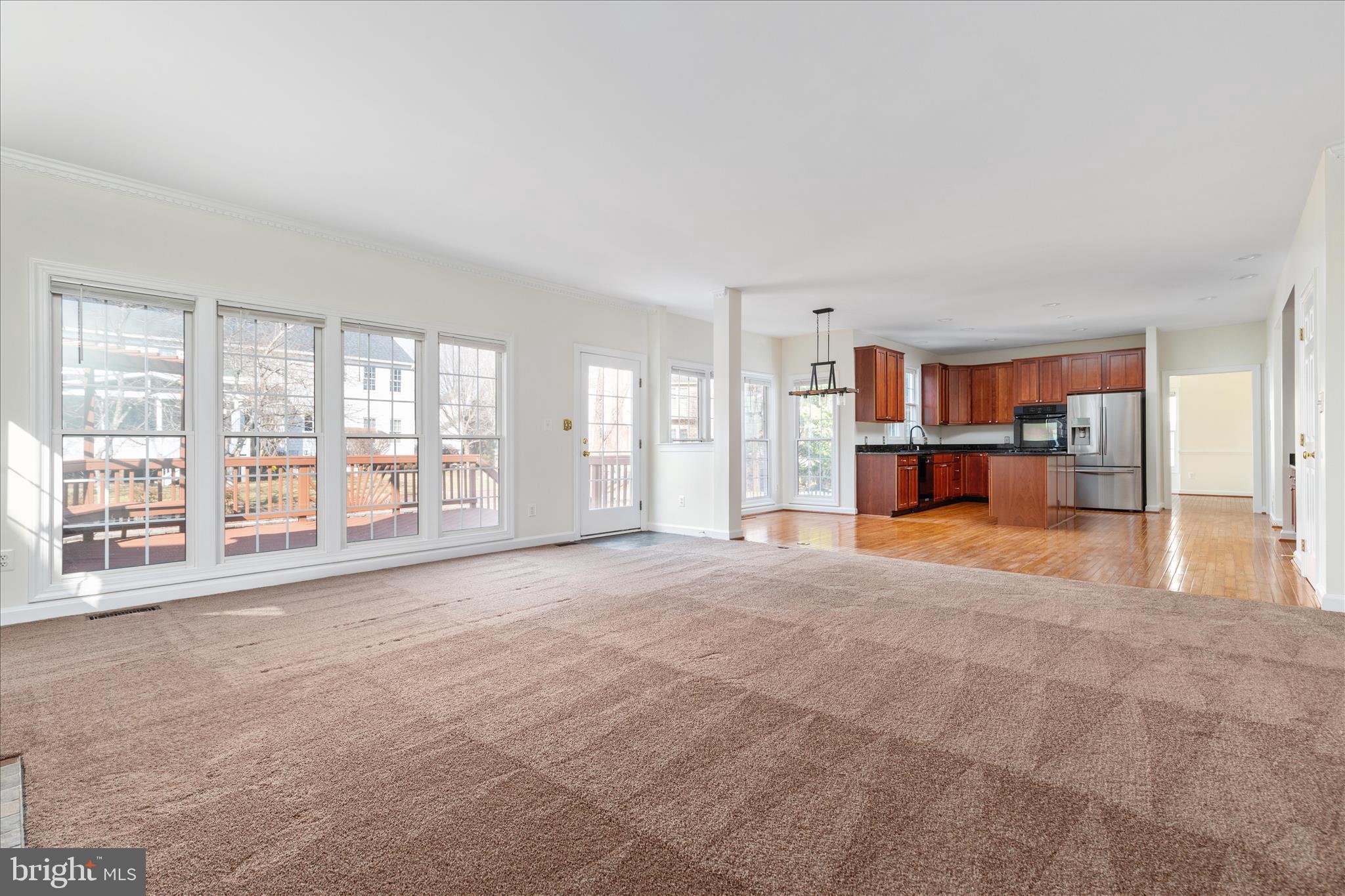 43331 Ritter Lane South Riding, VA 20152 - Photo 17 of 55 a view of empty room with a kitchen area