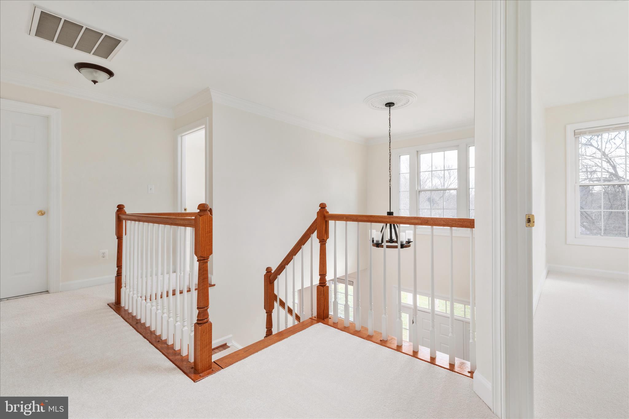 43331 Ritter Lane South Riding, VA 20152 - Photo 20 of 55 a view of a hallway with windows