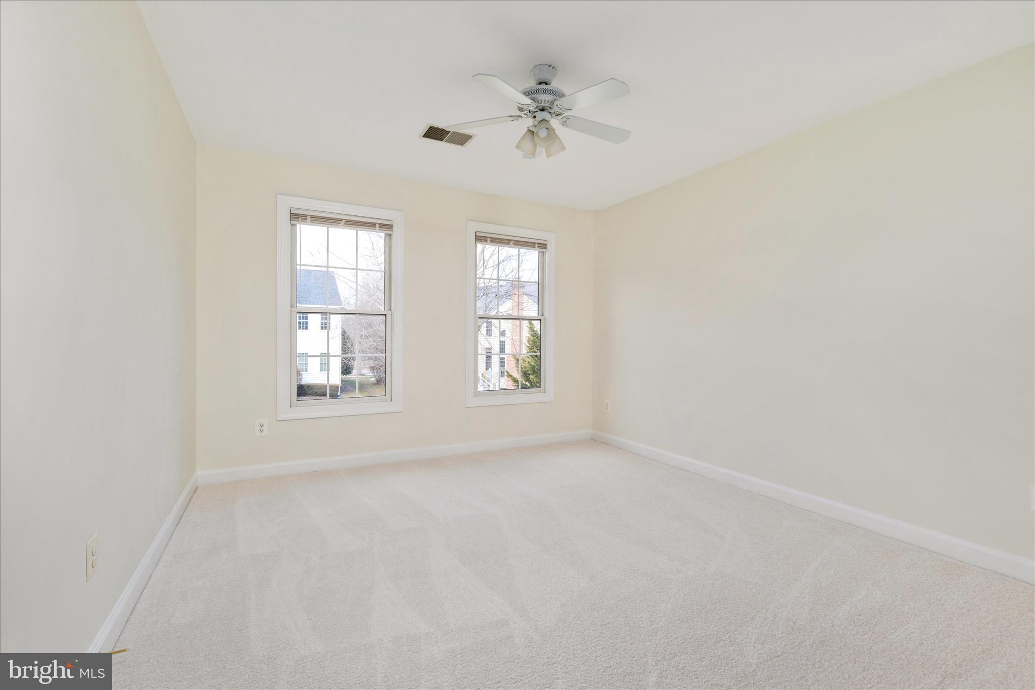 43331 Ritter Lane South Riding, VA 20152 - Photo 21 of 55 an empty room with windows and fan
