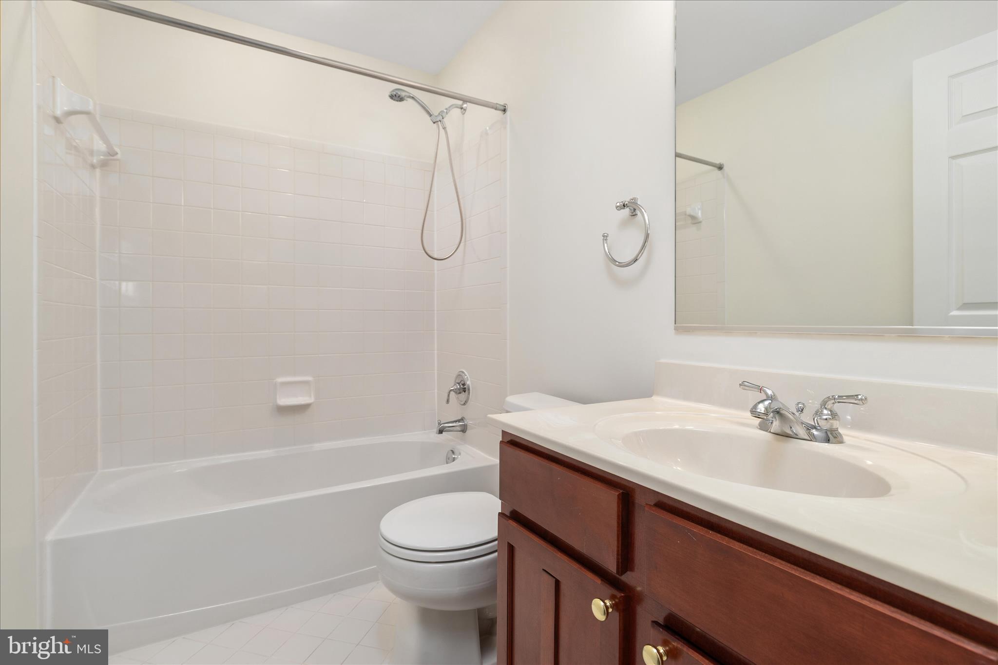 43331 Ritter Lane South Riding, VA 20152 - Photo 31 of 55 a bathroom with a sink a toilet and a bathtub