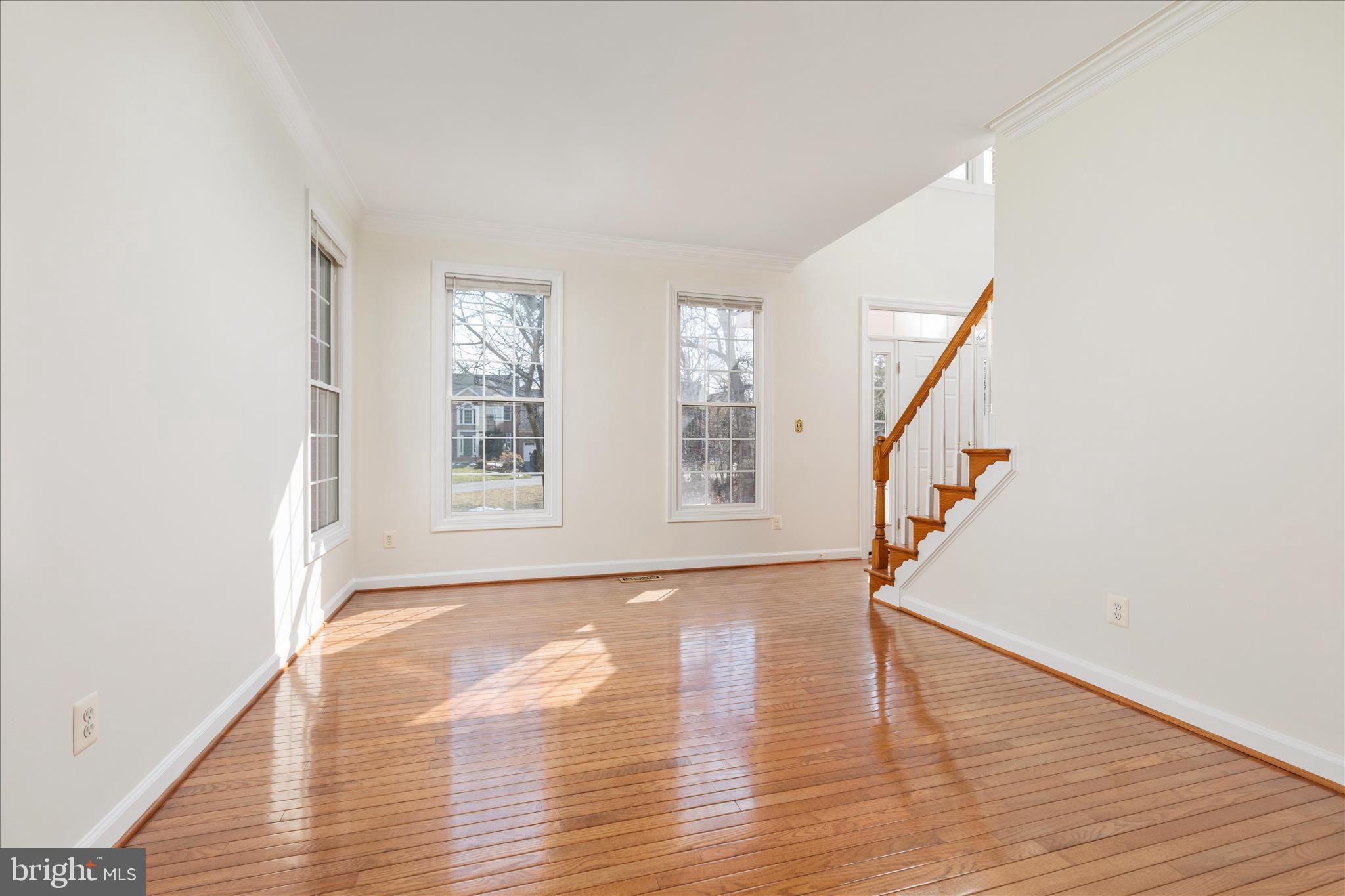 43331 Ritter Lane South Riding, VA 20152 - Photo 7 of 55 a view of an empty room with wooden floor and a window