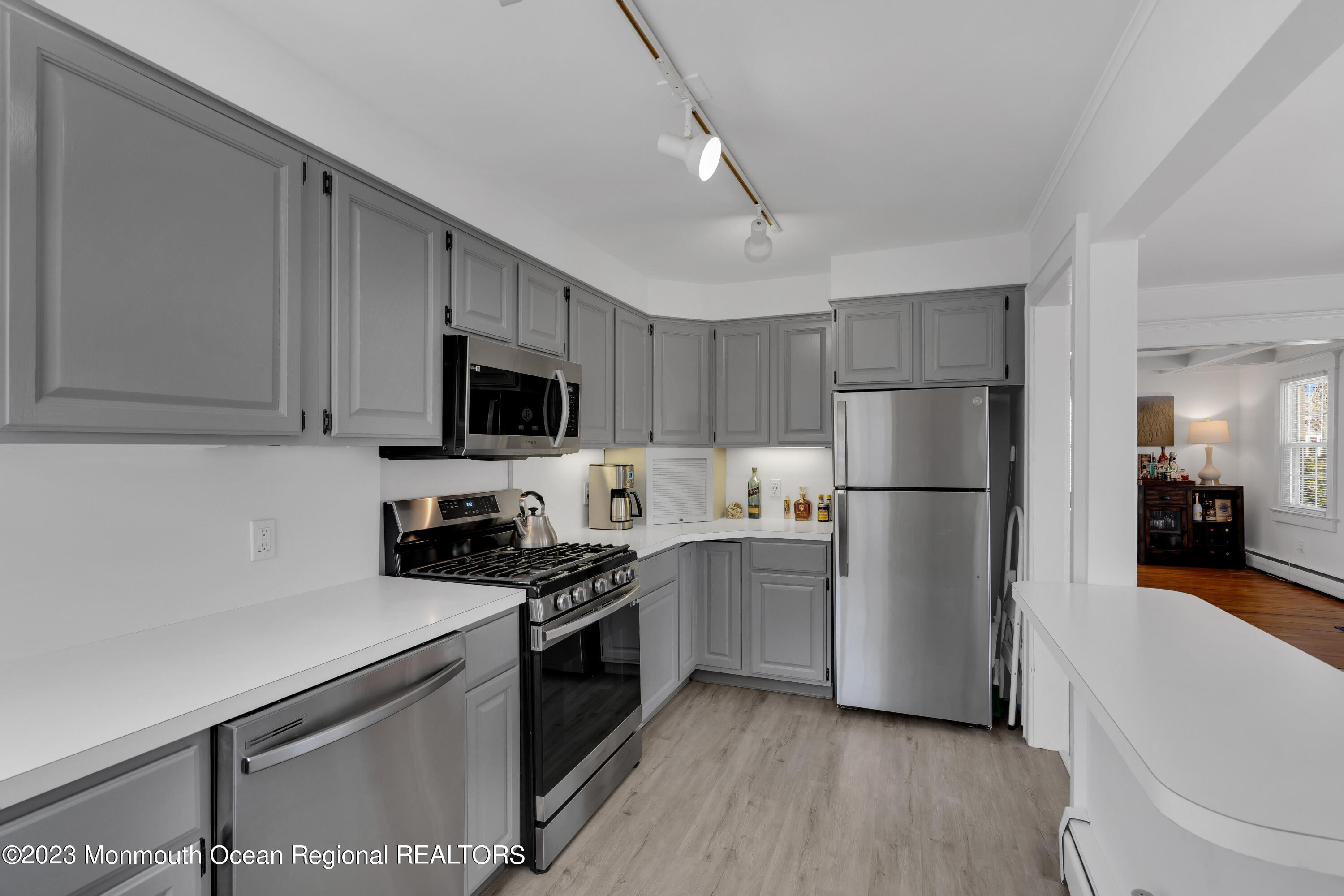 1107 5th Avenue Spring Lake, NJ 07762 - Photo 19 of 38 a kitchen with a sink a stove and refrigerator