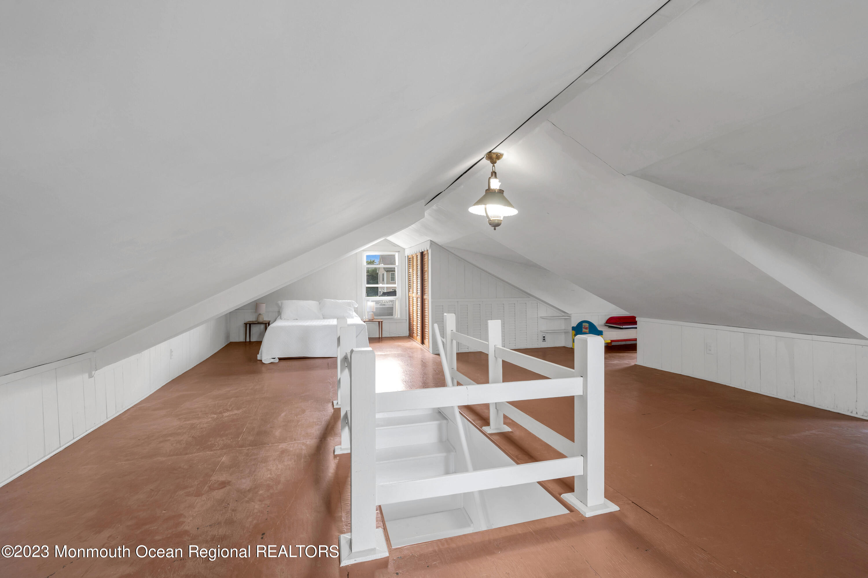 1107 5th Avenue Spring Lake, NJ 07762 - Photo 27 of 38 a view of staircase with a rug