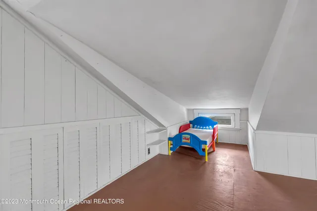 a children room with toys and wooden floor