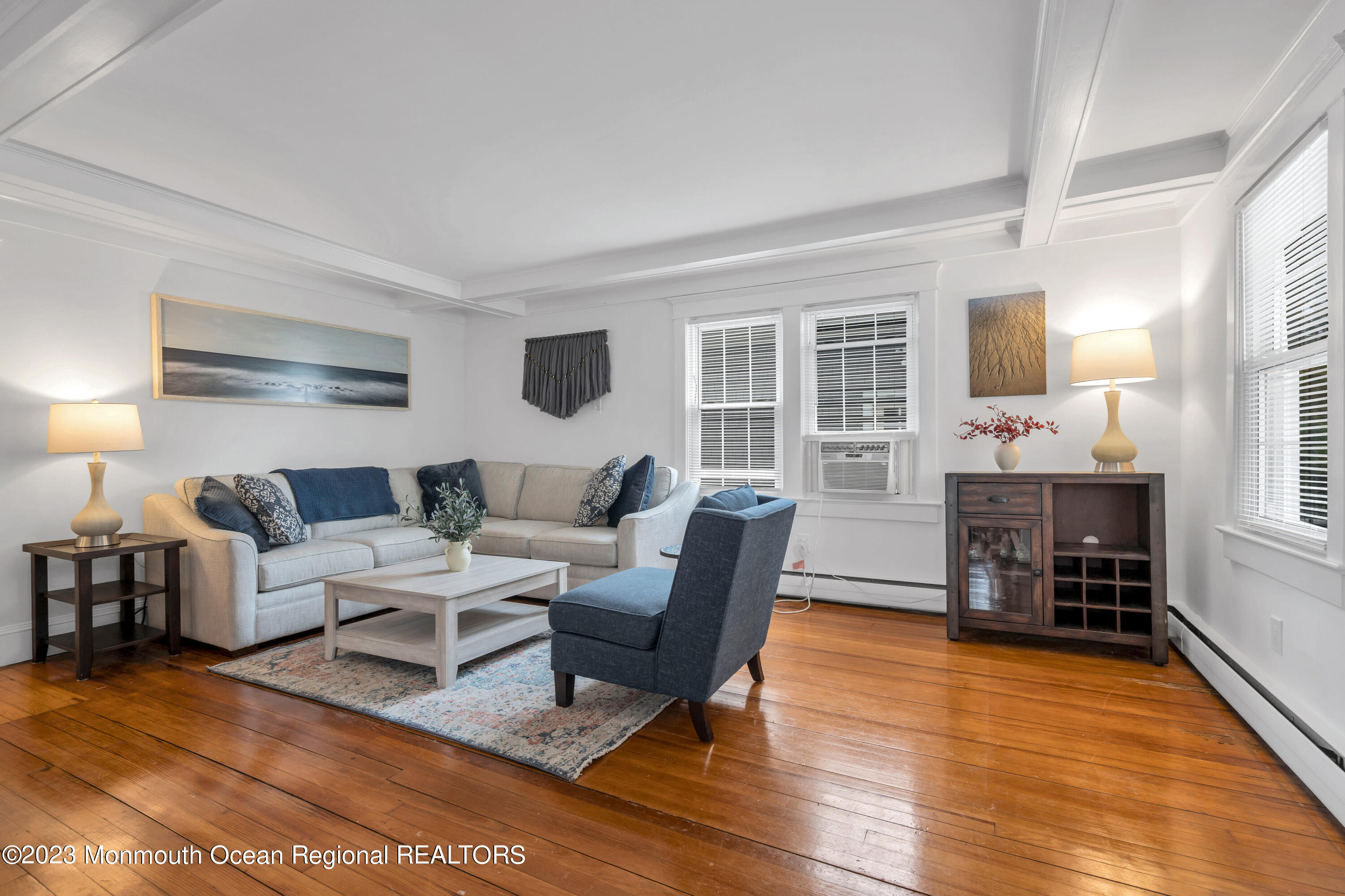 1107 5th Avenue Spring Lake, NJ 07762 - Photo 6 of 38 a living room with furniture and wooden floor