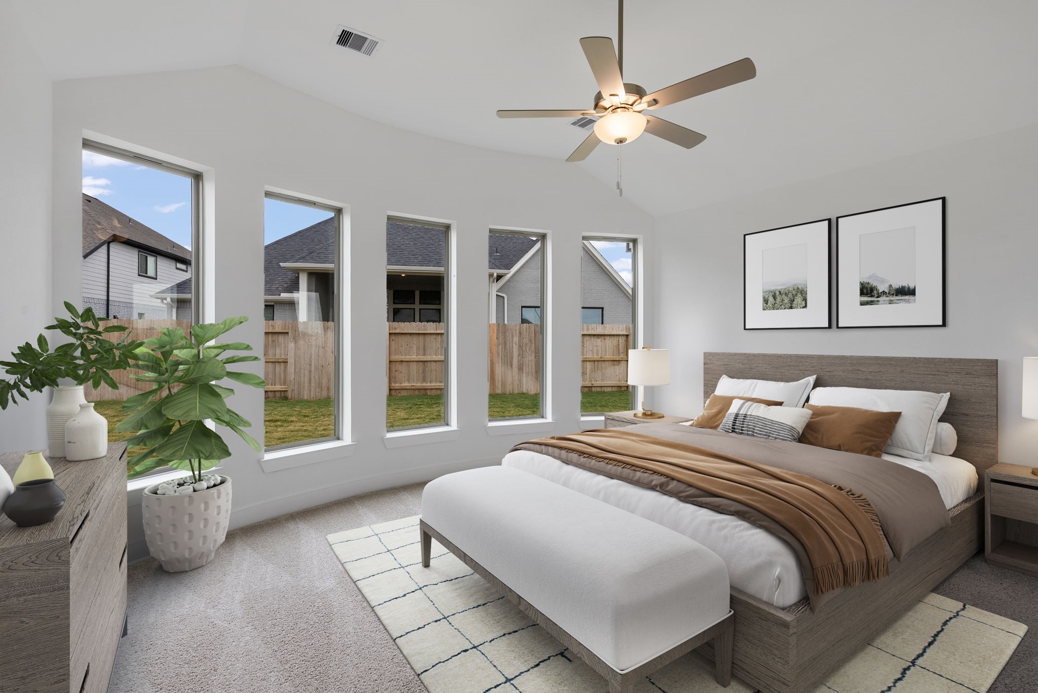 18806 Forested Street Manvel, TX 77578 - Photo 17 of 35 a bedroom with a large bed potted plant and a large window