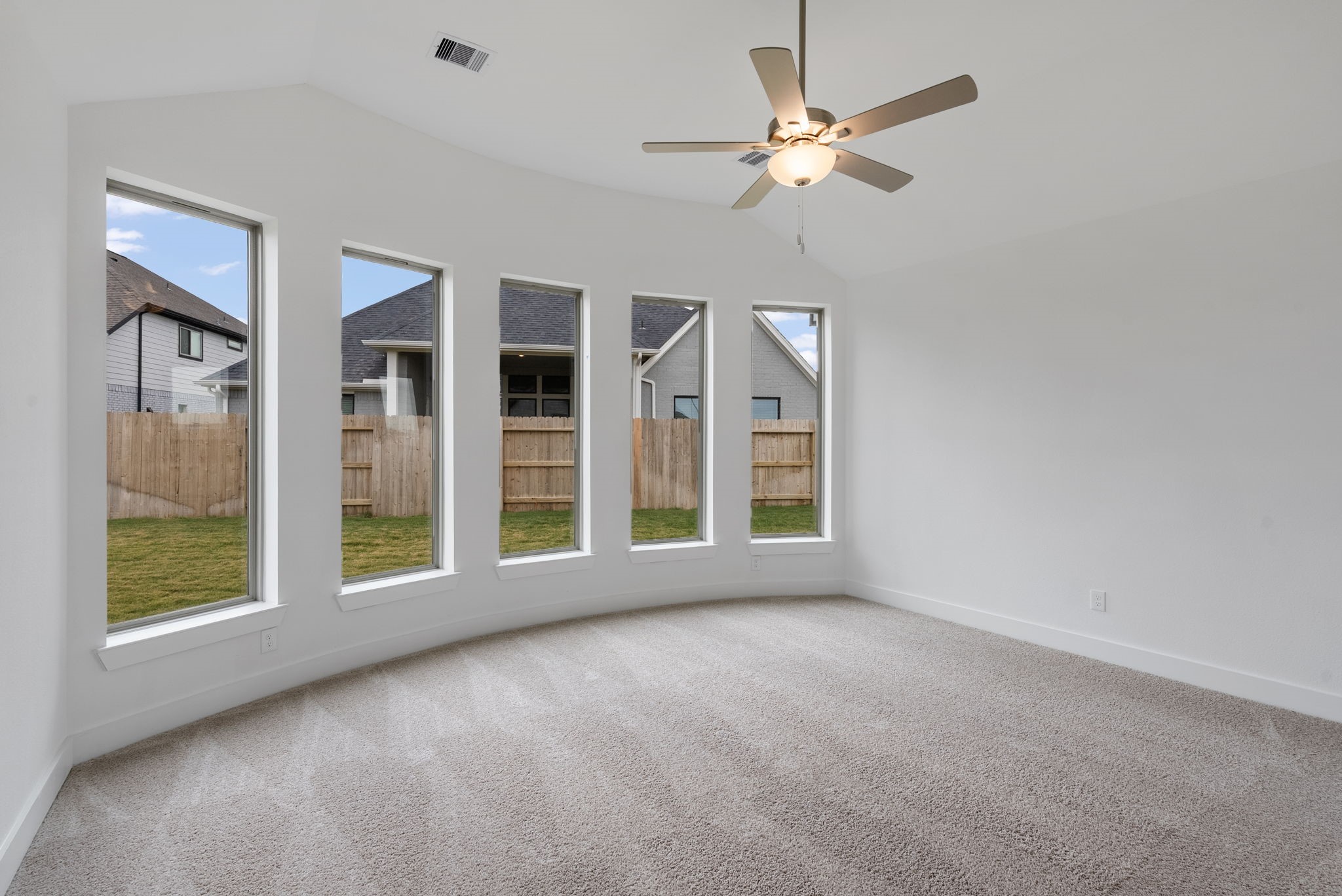18806 Forested Street Manvel, TX 77578 - Photo 18 of 35 a view of an empty room with a window