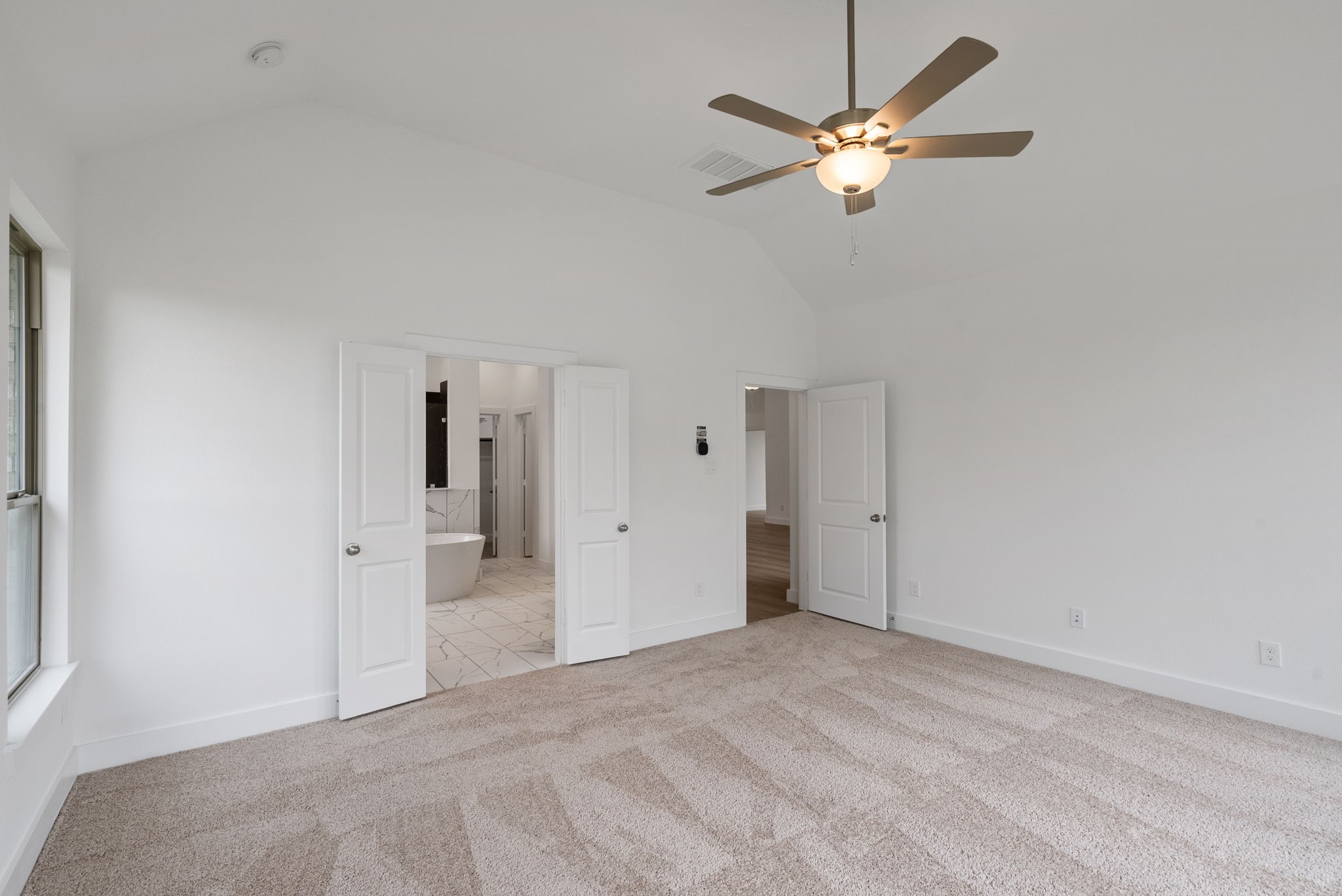 18806 Forested Street Manvel, TX 77578 - Photo 19 of 35 a view of a livingroom with a ceiling fan window and a ceiling fan