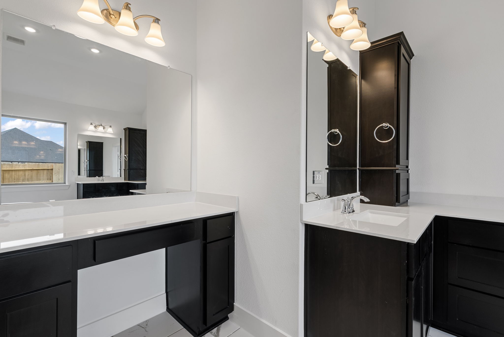 18806 Forested Street Manvel, TX 77578 - Photo 22 of 35 a bathroom with a sink a light fixture a vanity and a mirror