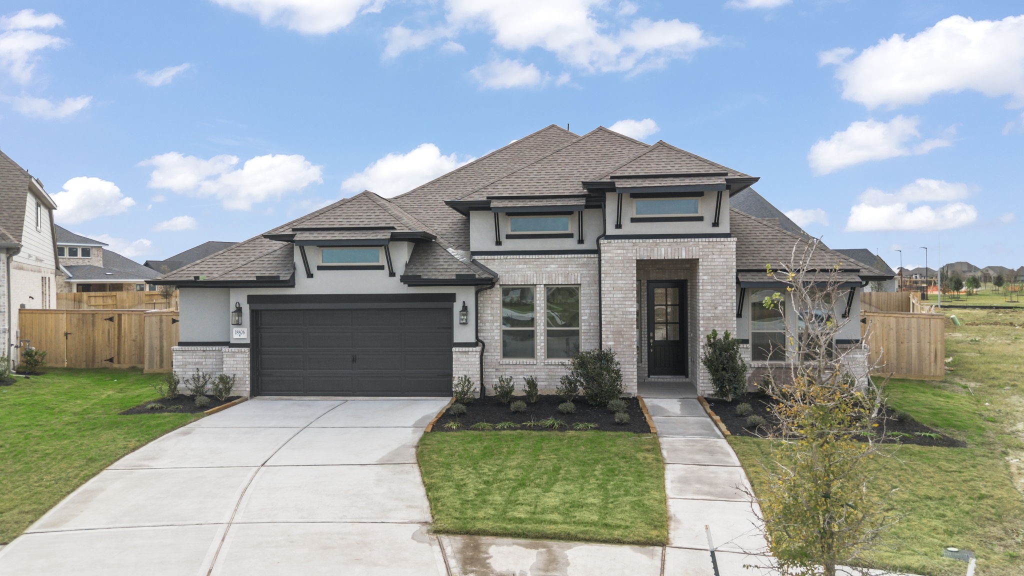18806 Forested Street Manvel, TX 77578 - Photo 29 of 35 a front view of a house with garden