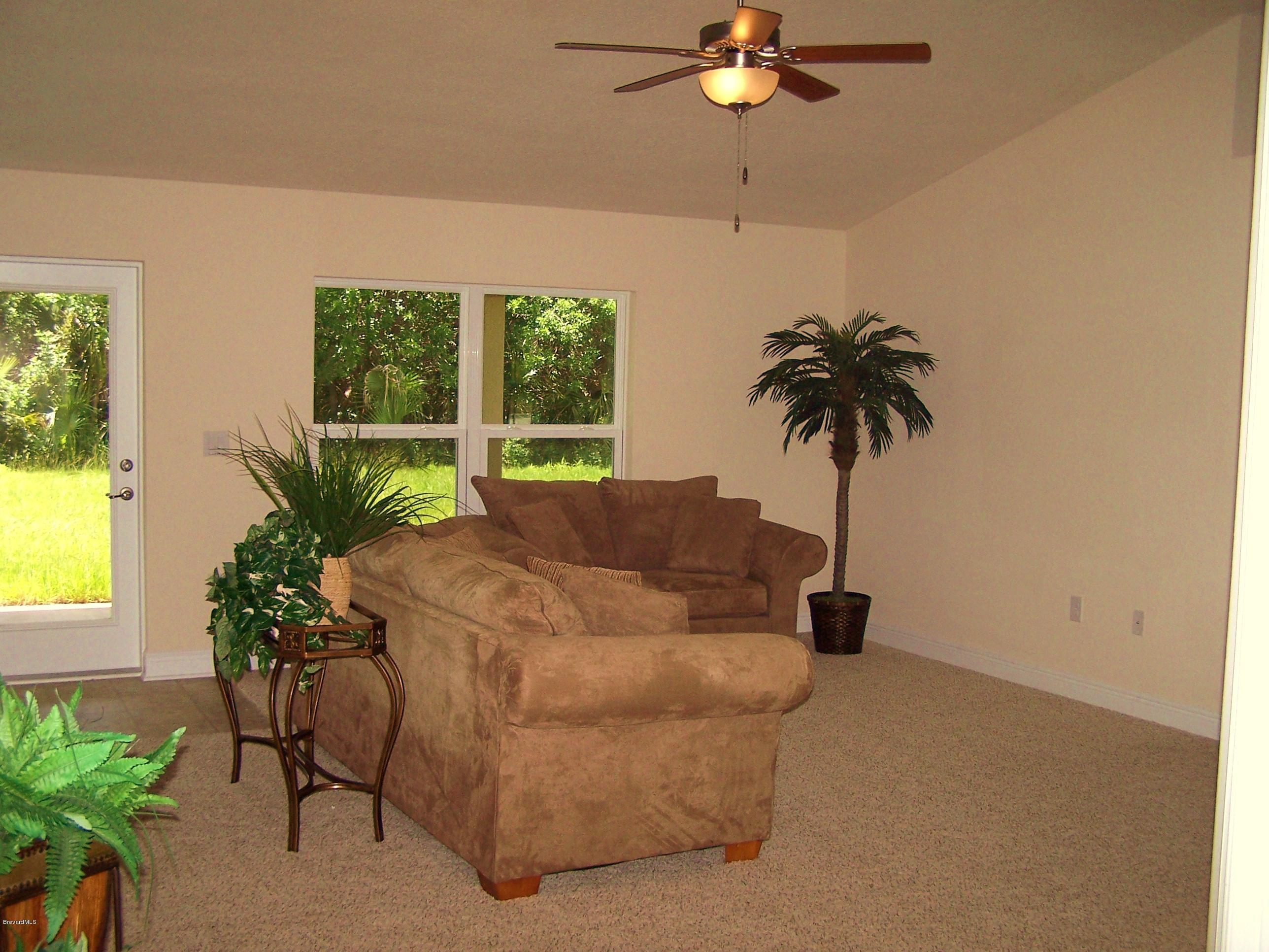 821 Degroodt Road Southwest Palm Bay, FL 32908 - Photo 2 of 10 821 DeGroodt Family Room