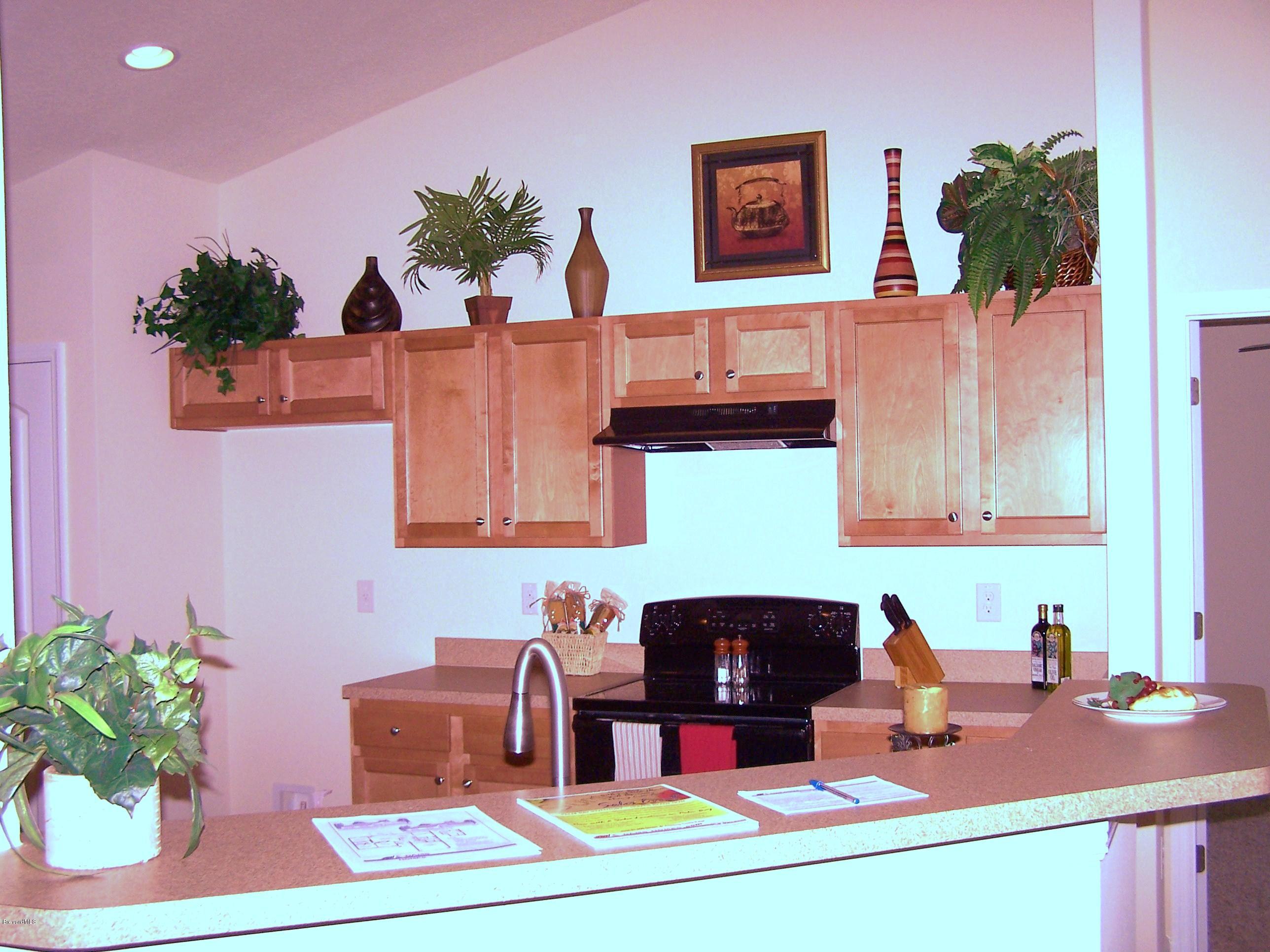 821 Degroodt Road Southwest Palm Bay, FL 32908 - Photo 3 of 10 821 DeGroodt Kitchen Picture 1