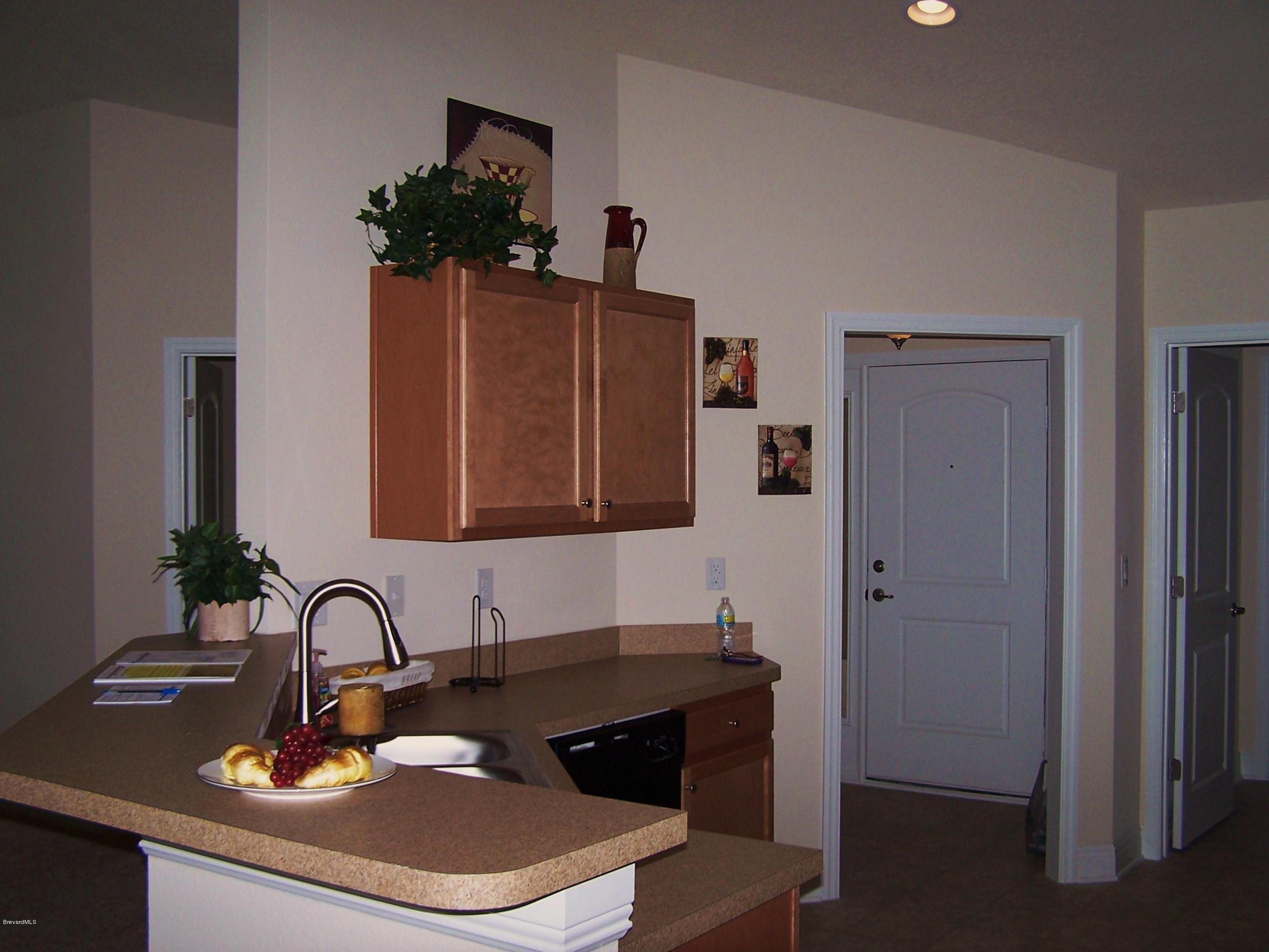 821 Degroodt Road Southwest Palm Bay, FL 32908 - Photo 4 of 10 821 DeGroodt Kitchen Picture 2
