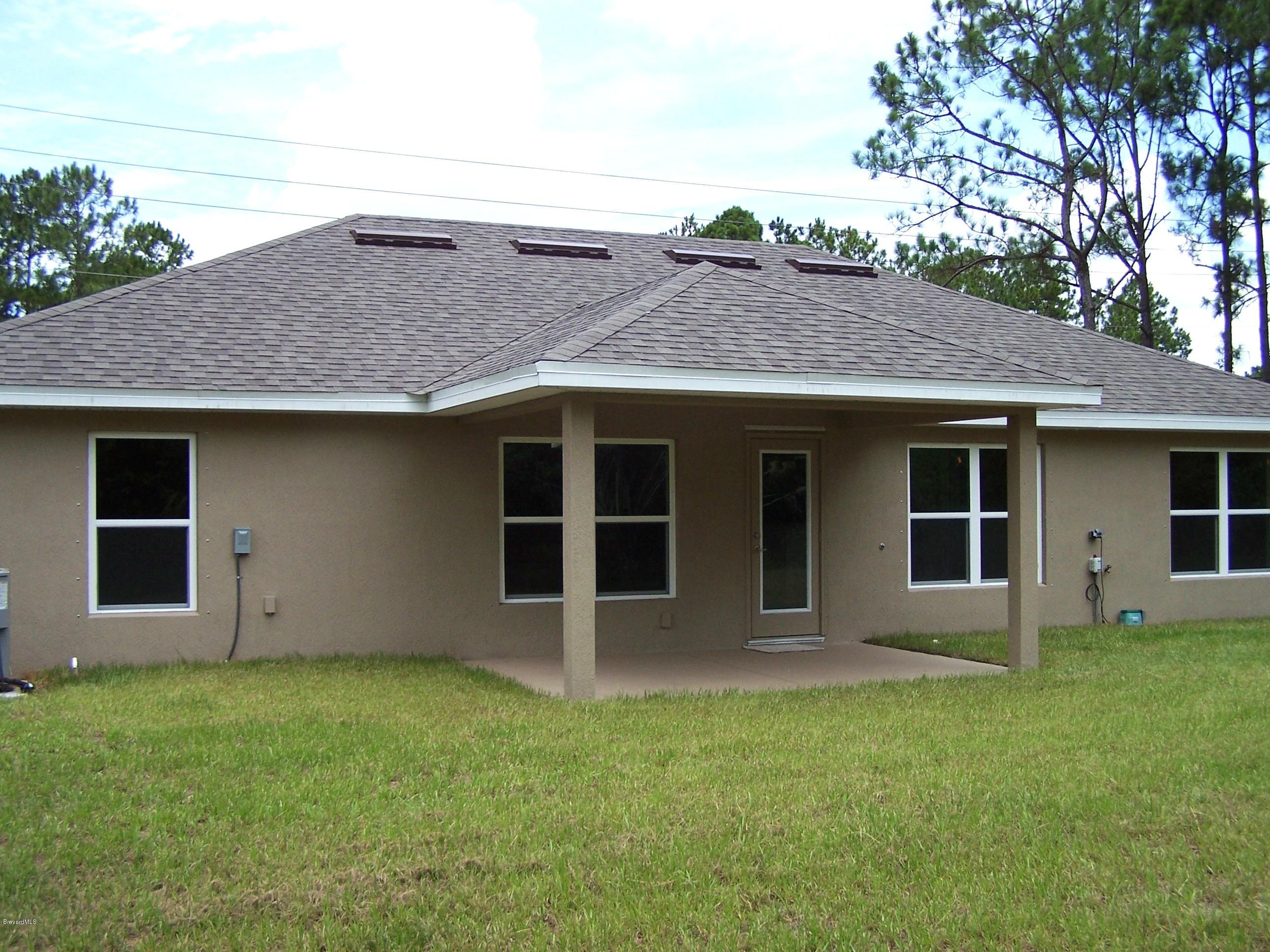 821 Degroodt Road Southwest Palm Bay, FL 32908 - Photo 7 of 10 821 DeGroodt Back Porch