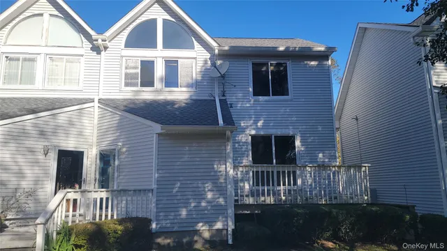 a front view of a house with garage