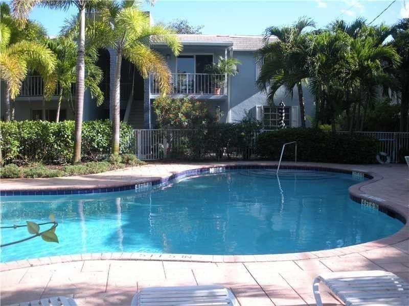 2607 Northeast 8th Avenue, Unit 7 Wilton Manors, FL 33334 - Photo 18 of 30 a view of swimming pool with a patio