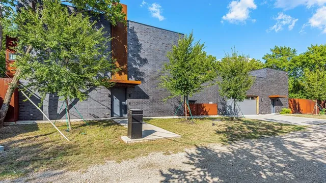 a swimming pool with some trees in the background