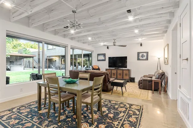 a view of a livingroom with furniture window and outside view