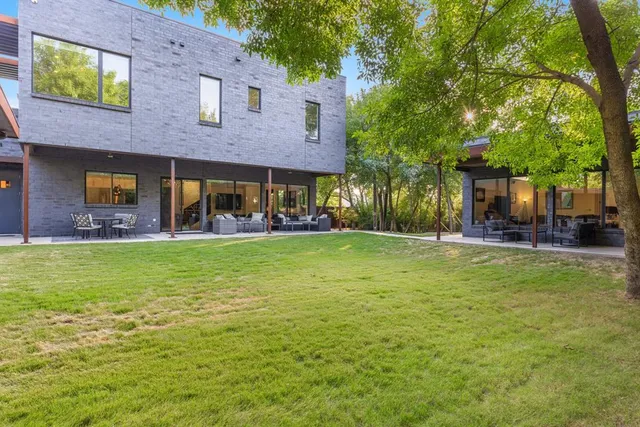 a front view of a building with garden