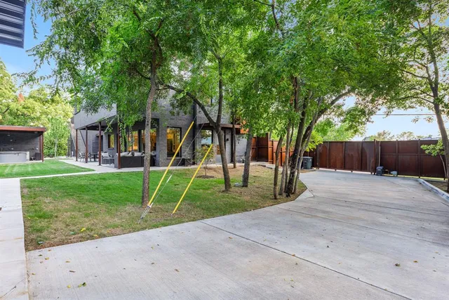 a view of a house with a back yard