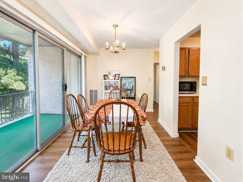 3760 Bel Pre Road, Unit 376014 Silver Spring, MD 20906 - Photo 3 of 10 Dining room- AI enhanced