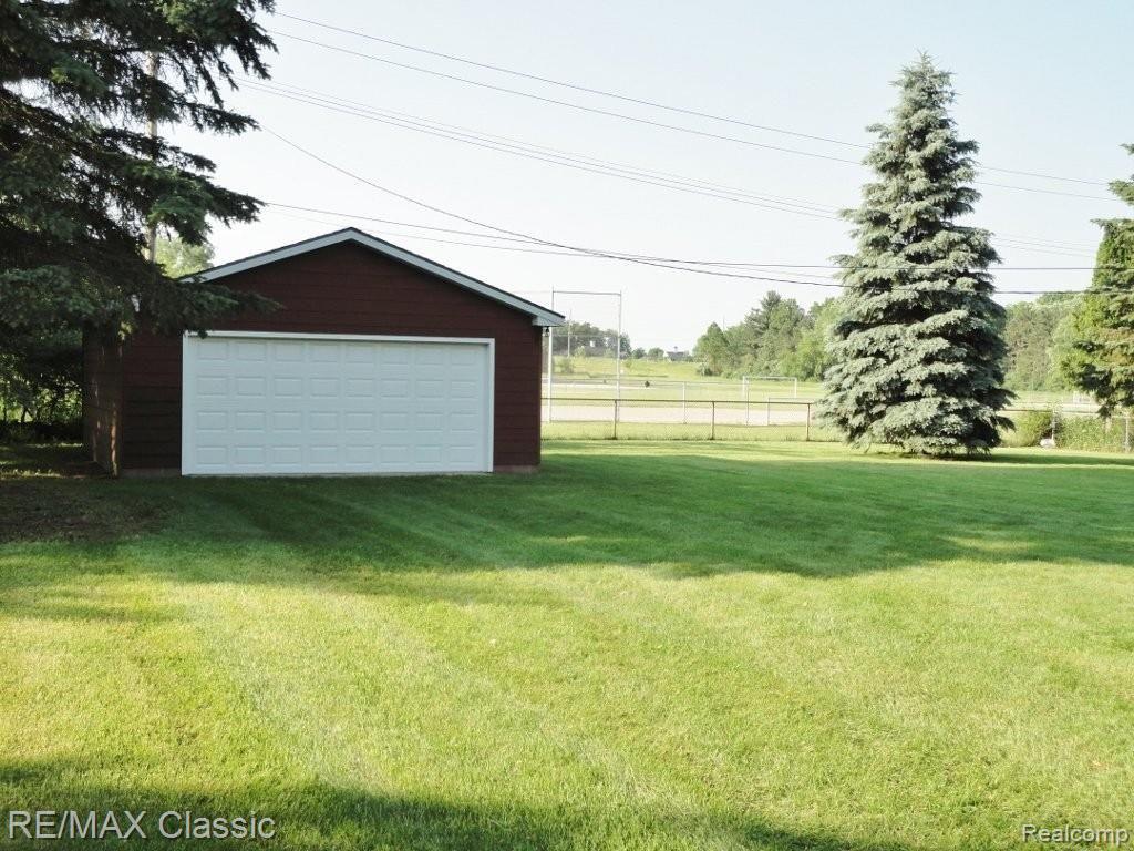620 West Livingston Road Highland, MI 48357 - Photo 24 of 25 2nd garage & fenced backyard