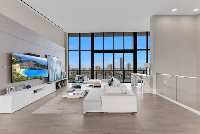 a living room with furniture and view of living room