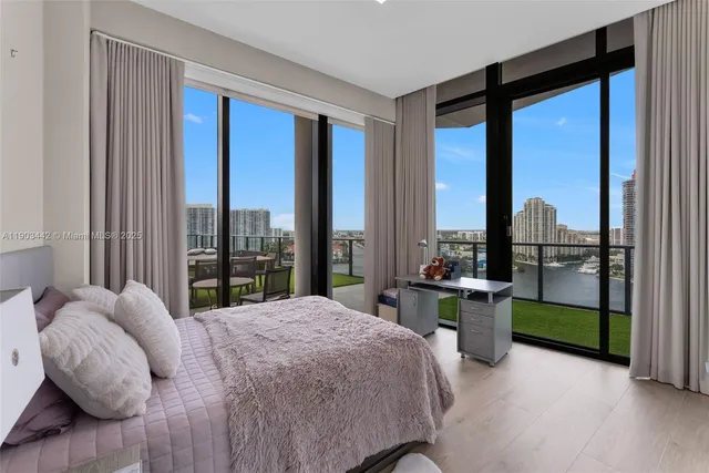 a bathroom with a sink toilet vanity and shower
