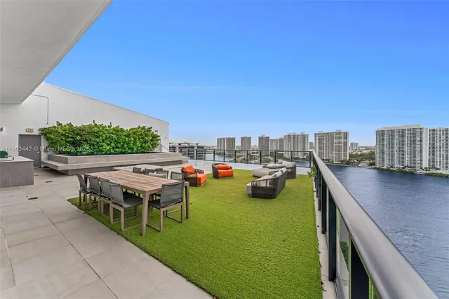 a view of balcony with furniture