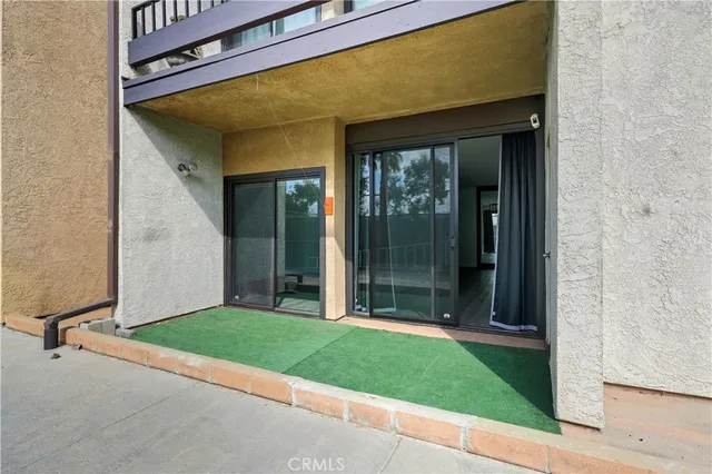 a view of a backyard with a garden and plants
