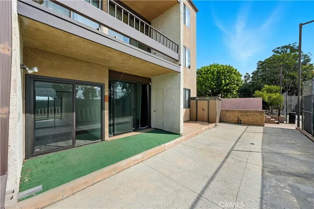 a view of a building with a garden