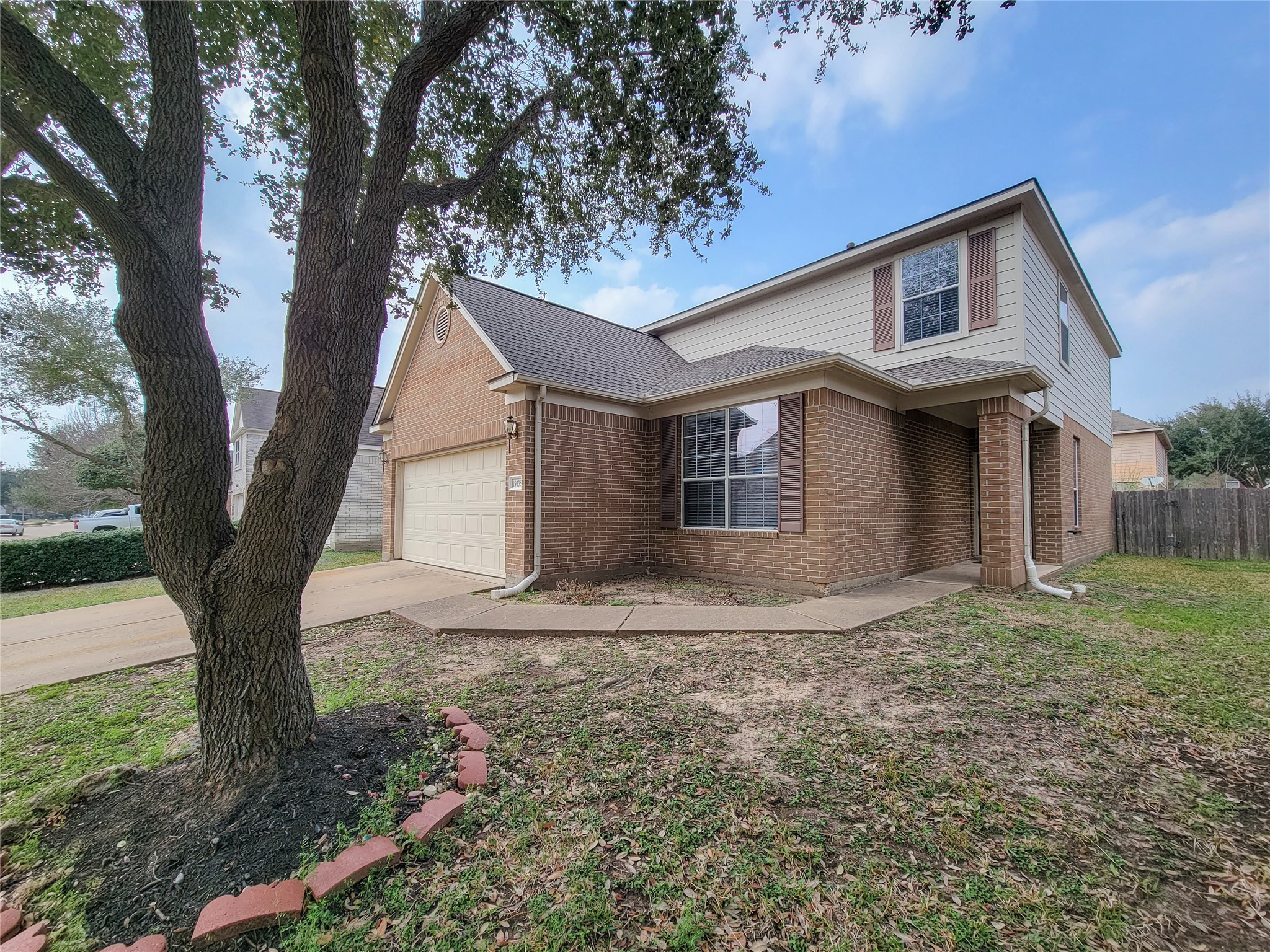 19338 Harvest Stream Way Houston, TX 77084 - Photo 2 of 49 a view of a house with a yard