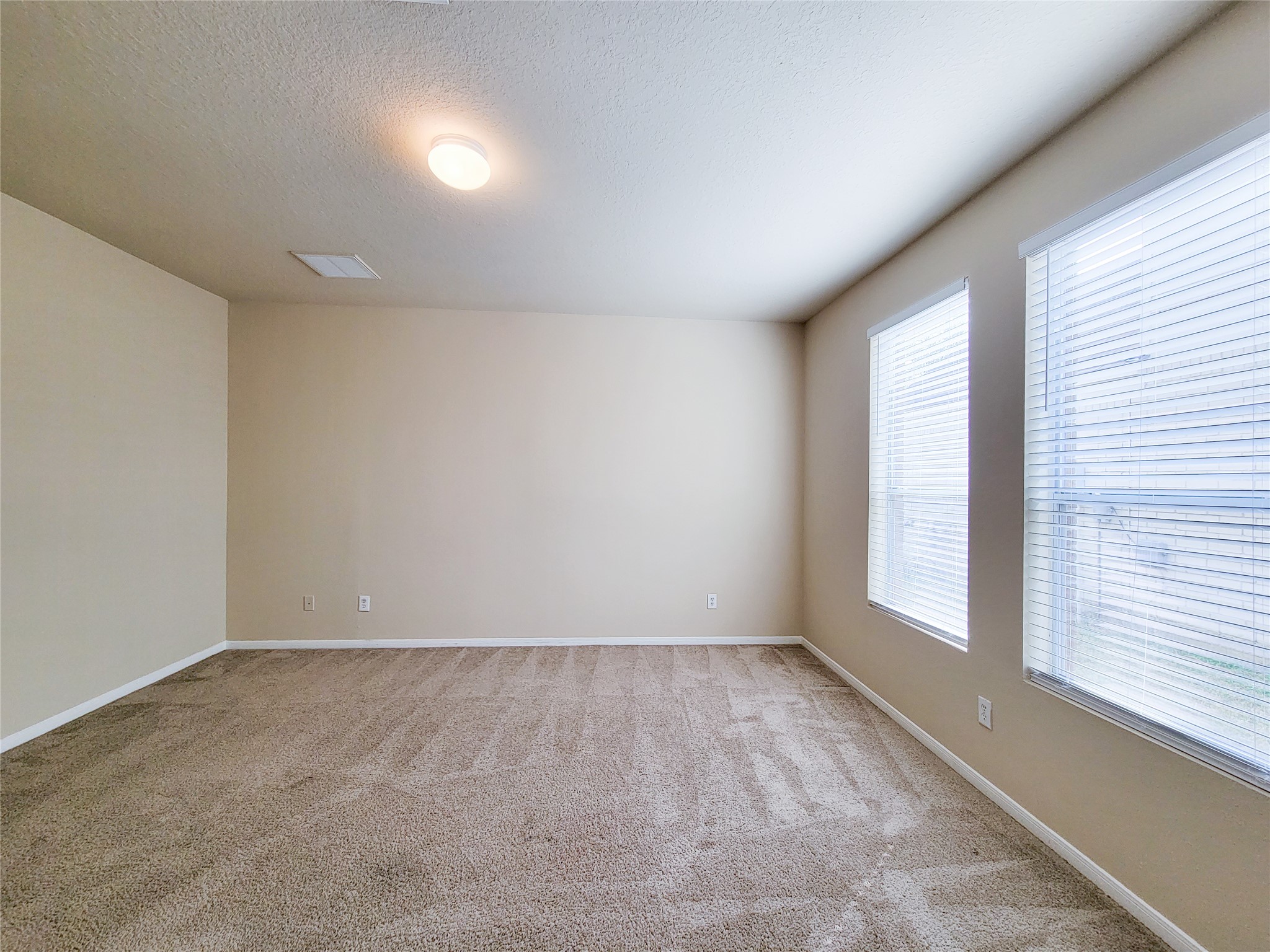 19338 Harvest Stream Way Houston, TX 77084 - Photo 25 of 49 an empty room with a window