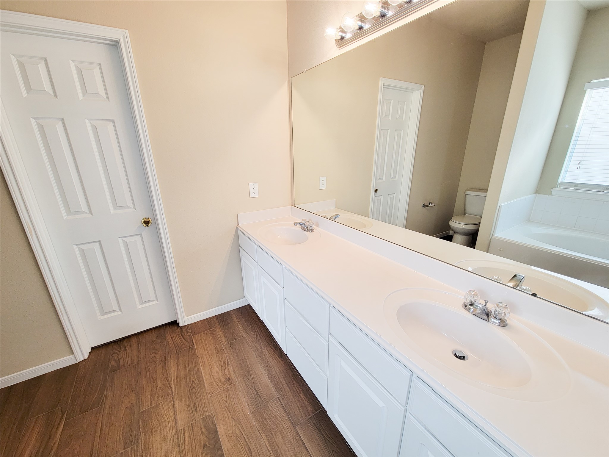 19338 Harvest Stream Way Houston, TX 77084 - Photo 29 of 49 a bathroom with a sink and a mirror