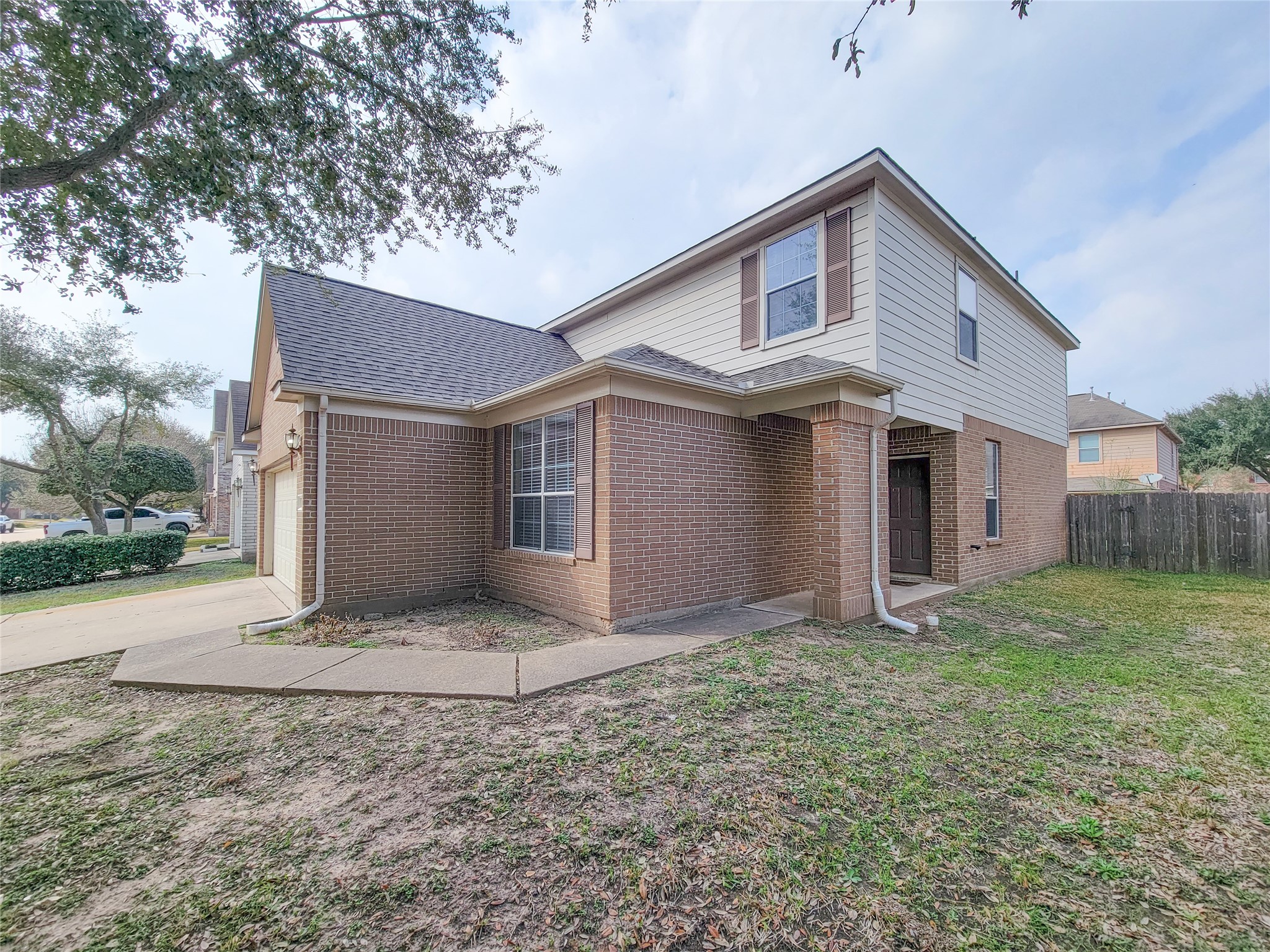 19338 Harvest Stream Way Houston, TX 77084 - Photo 4 of 49 a view of a house with a yard and pathway