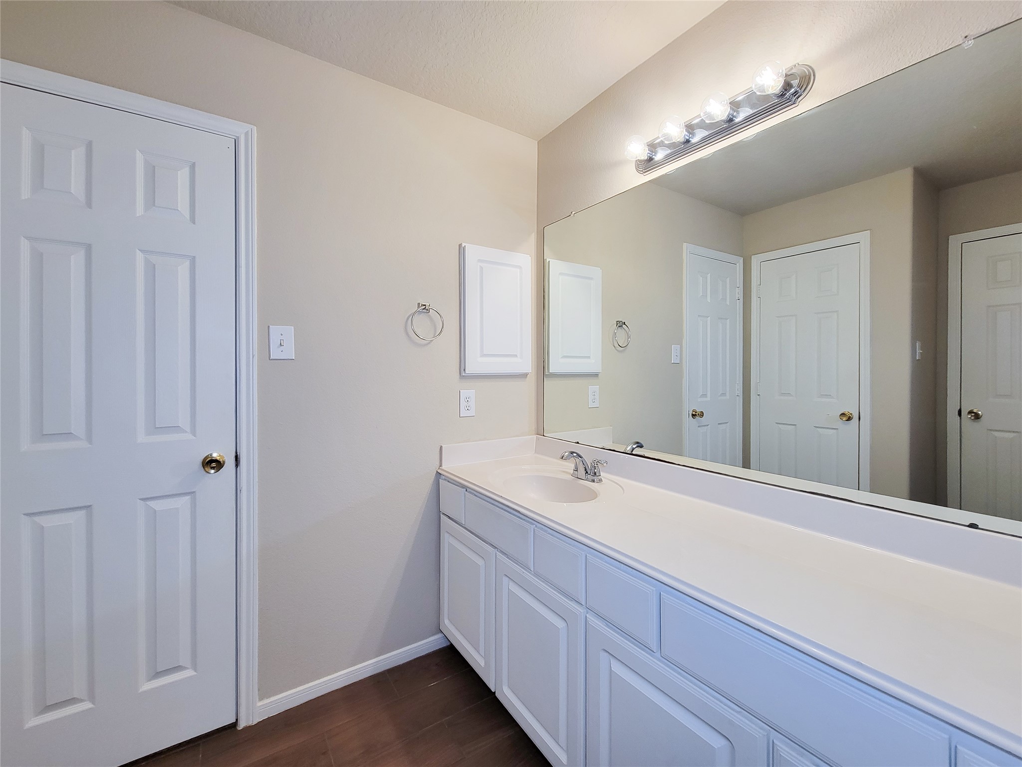 19338 Harvest Stream Way Houston, TX 77084 - Photo 43 of 49 a bathroom with a sink and a mirror