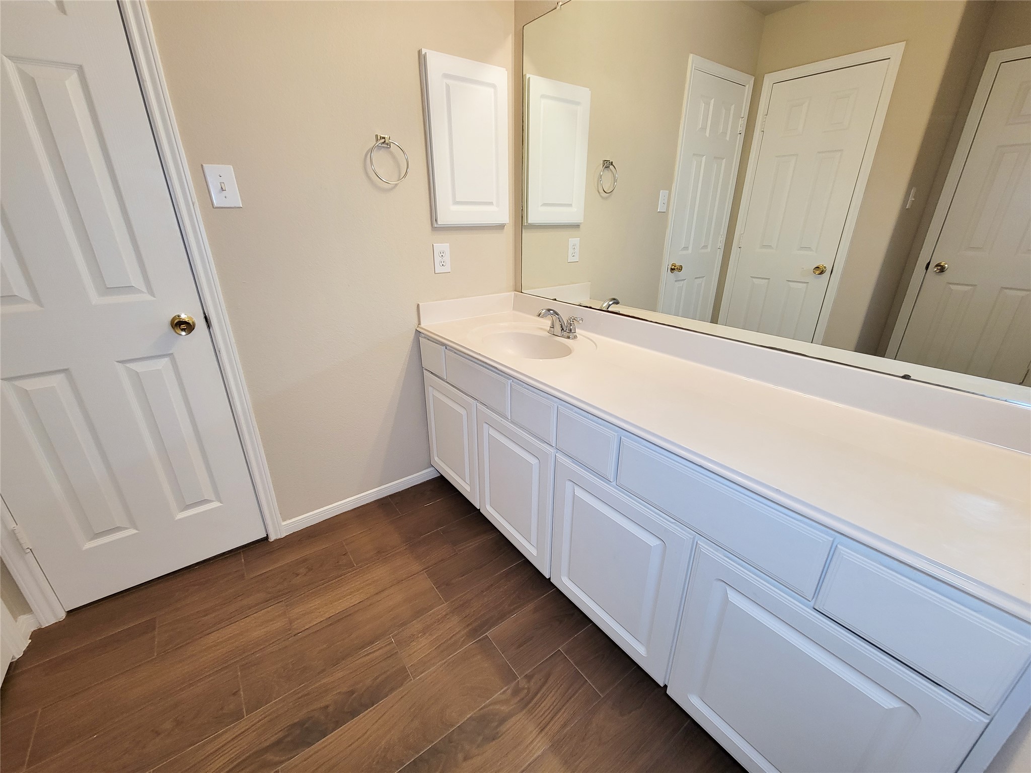 19338 Harvest Stream Way Houston, TX 77084 - Photo 44 of 49 a spacious bathroom with a vanity and a mirror
