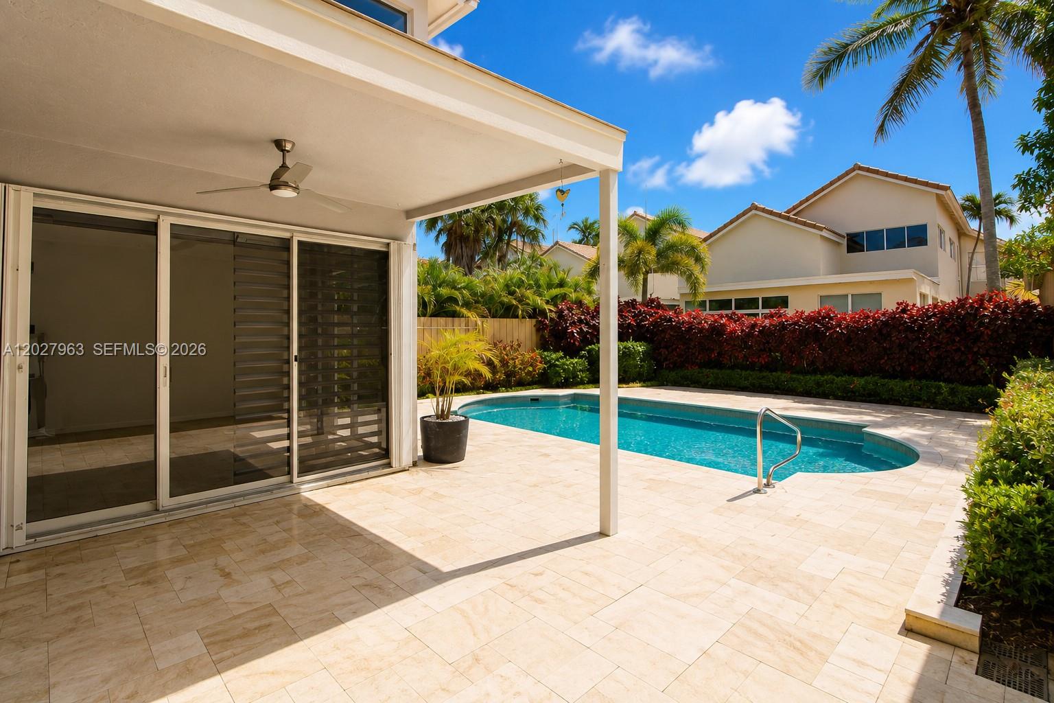 6646 Northwest 25th Terrace Boca Raton, FL 33496 - Photo 34 of 48 a view of a backyard of a house