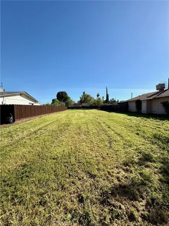 a view of a lake from a yard