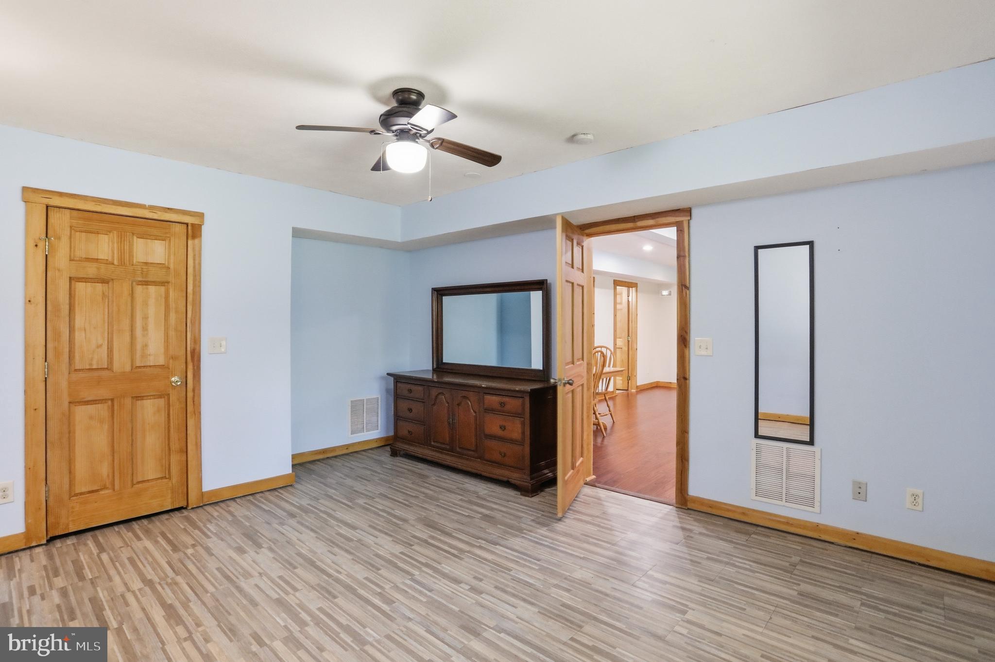 1400 Core Road Romney, WV 26757 - Photo 32 of 73 a view of an empty room with wooden floor and a window