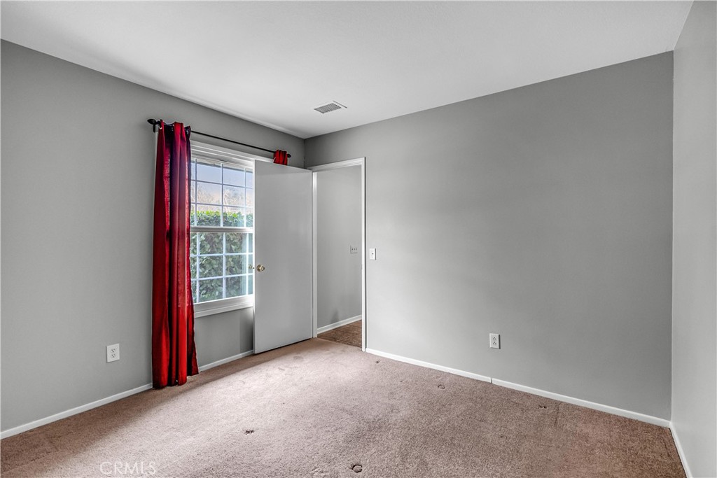 5544 Wentworth Drive Riverside, CA 92505 - Photo 13 of 29 a view of an empty room with a window