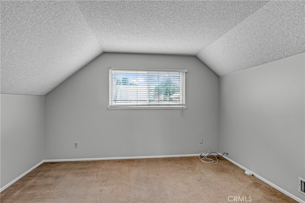 5544 Wentworth Drive Riverside, CA 92505 - Photo 17 of 29 an empty room with a window