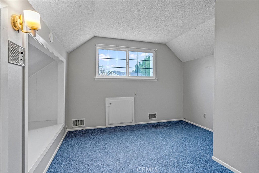 5544 Wentworth Drive Riverside, CA 92505 - Photo 20 of 29 an empty room with a window