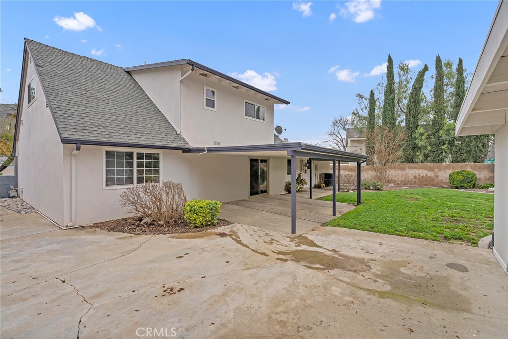 5544 Wentworth Drive Riverside, CA 92505 - Photo 27 of 29 a front view of a house with garden