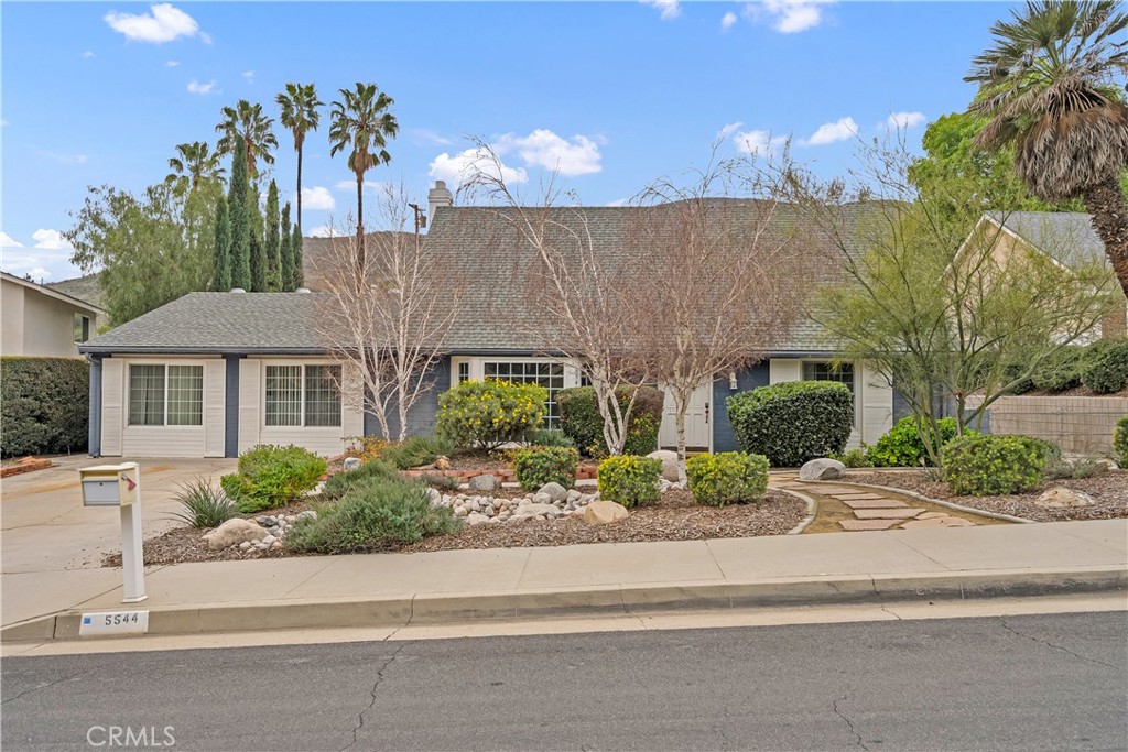 5544 Wentworth Drive Riverside, CA 92505 - Photo 28 of 29 front view of a house with a yard and potted plants