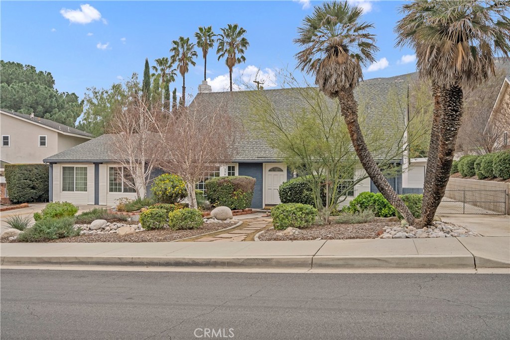 5544 Wentworth Drive Riverside, CA 92505 - Photo 29 of 29 front view of a house with a yard and potted plants