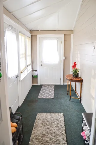 a room with toys and a rug