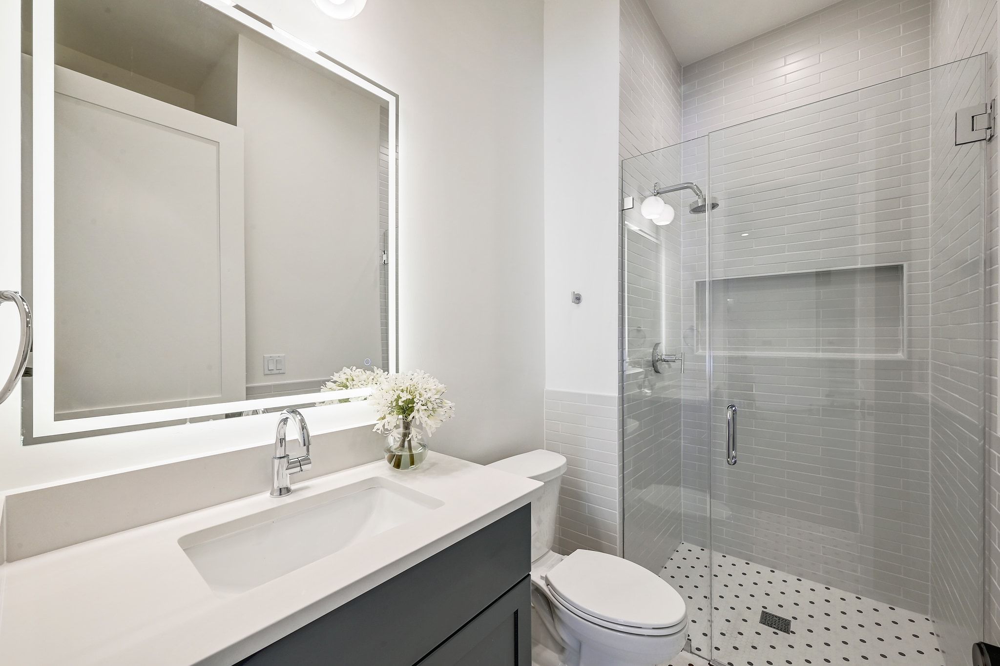 1705 Cullen Avenue Austin, TX 78757 - Photo 16 of 35 a bathroom with a sink a toilet and shower